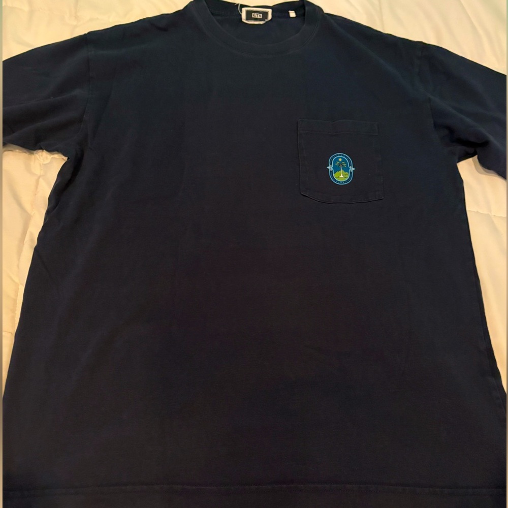 Navy kith shirt very rare piece paid 300 take for a steal beautiful designs
